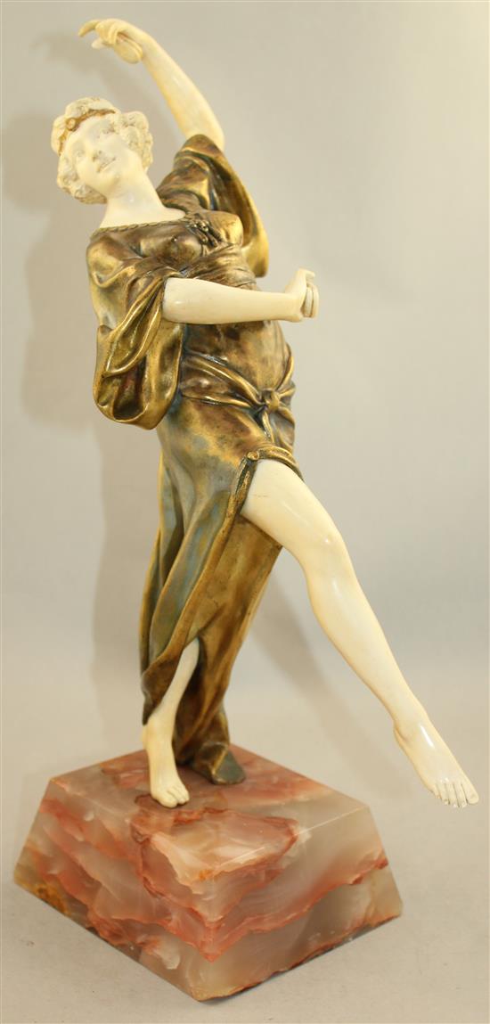 Eduardo Rossi (1867-1926). An Art Deco ivory and gilt bronze figure Oriental Dancer, overall 16.5in.